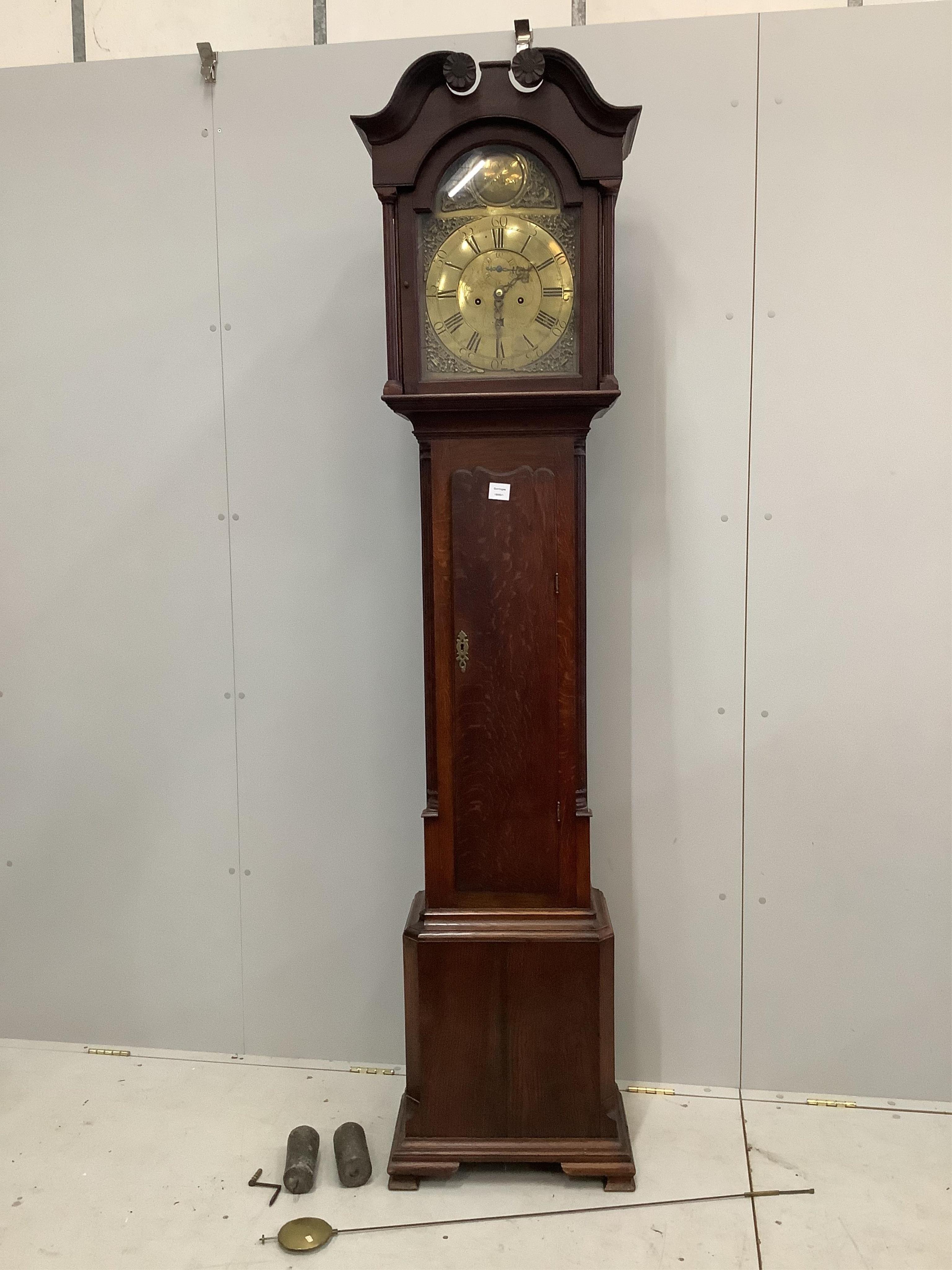 A mid 18th century oak eight day longcase clock, the brass dial signed Jonan. Graham, height 218cm. Condition - fair